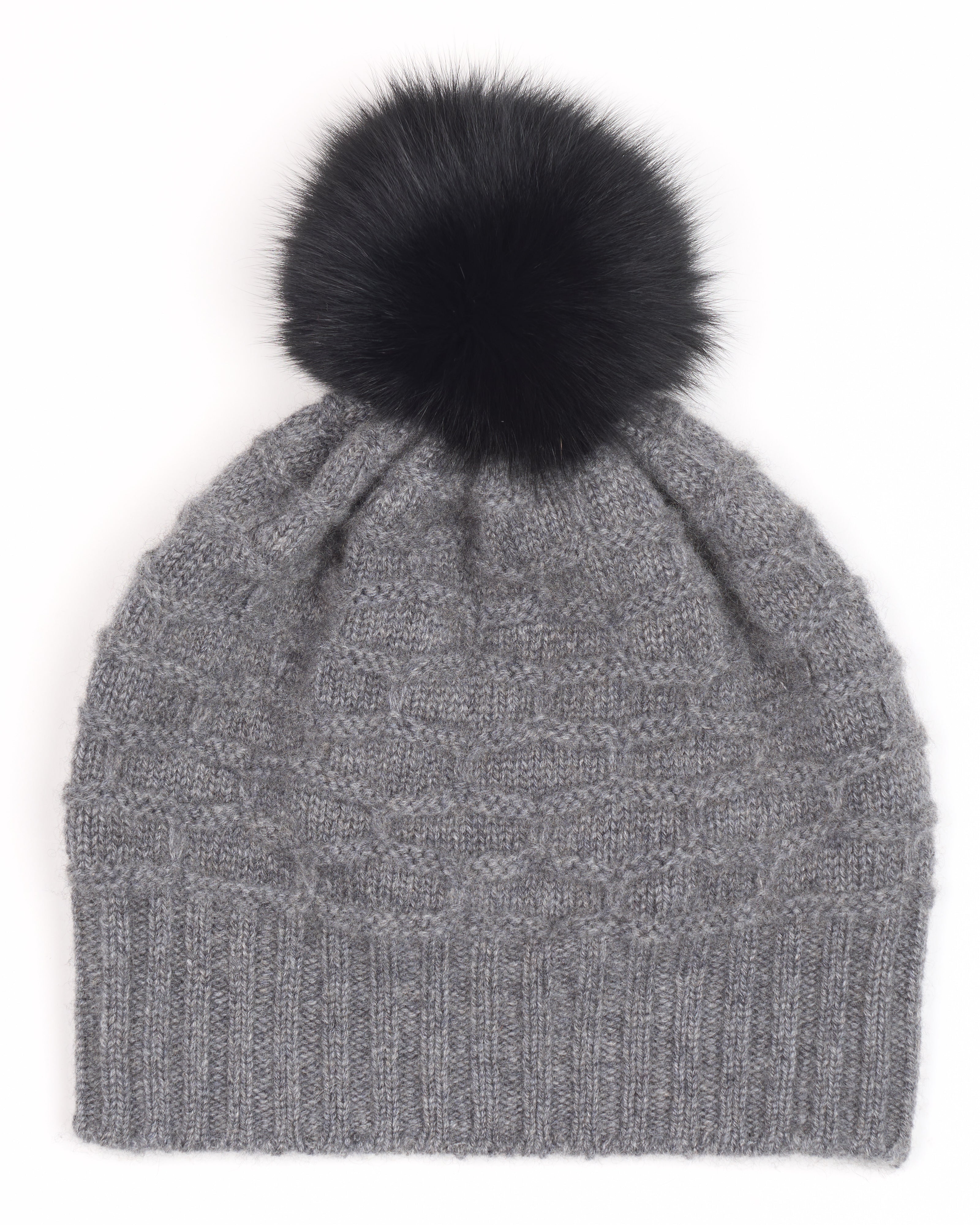 Cuffia in cashmere con pon pon