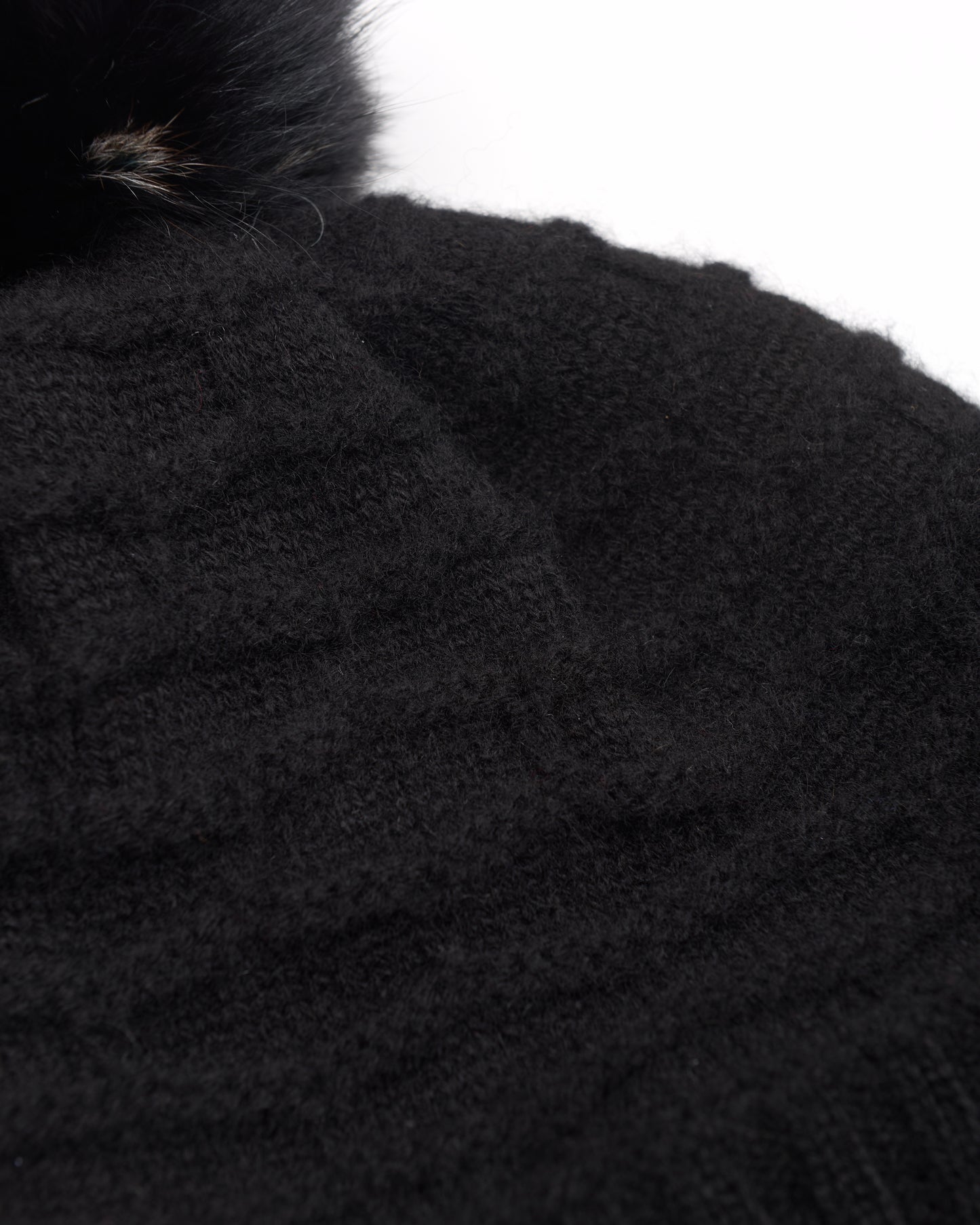 Cuffia in cashmere con pon pon