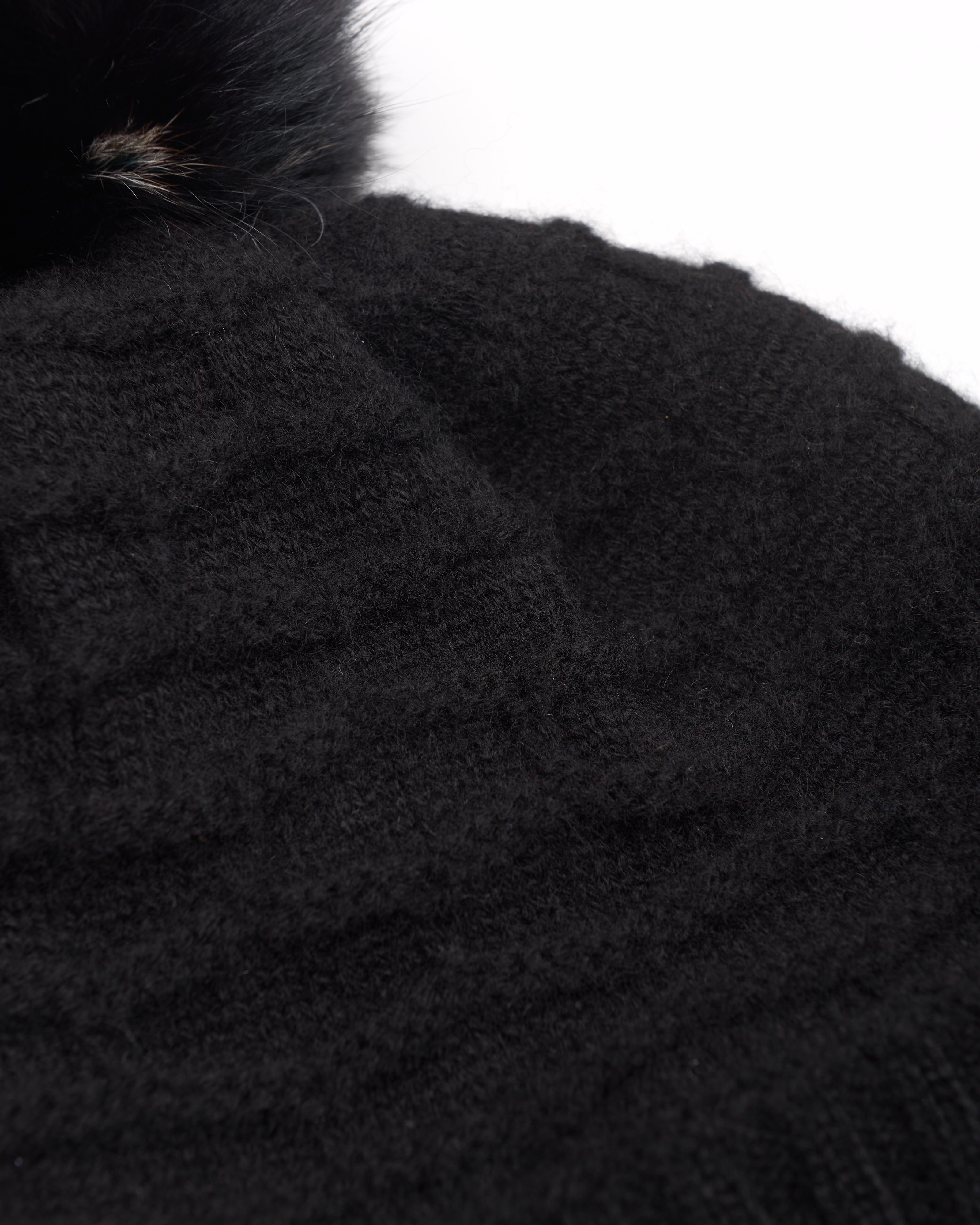 Cuffia in cashmere con pon pon