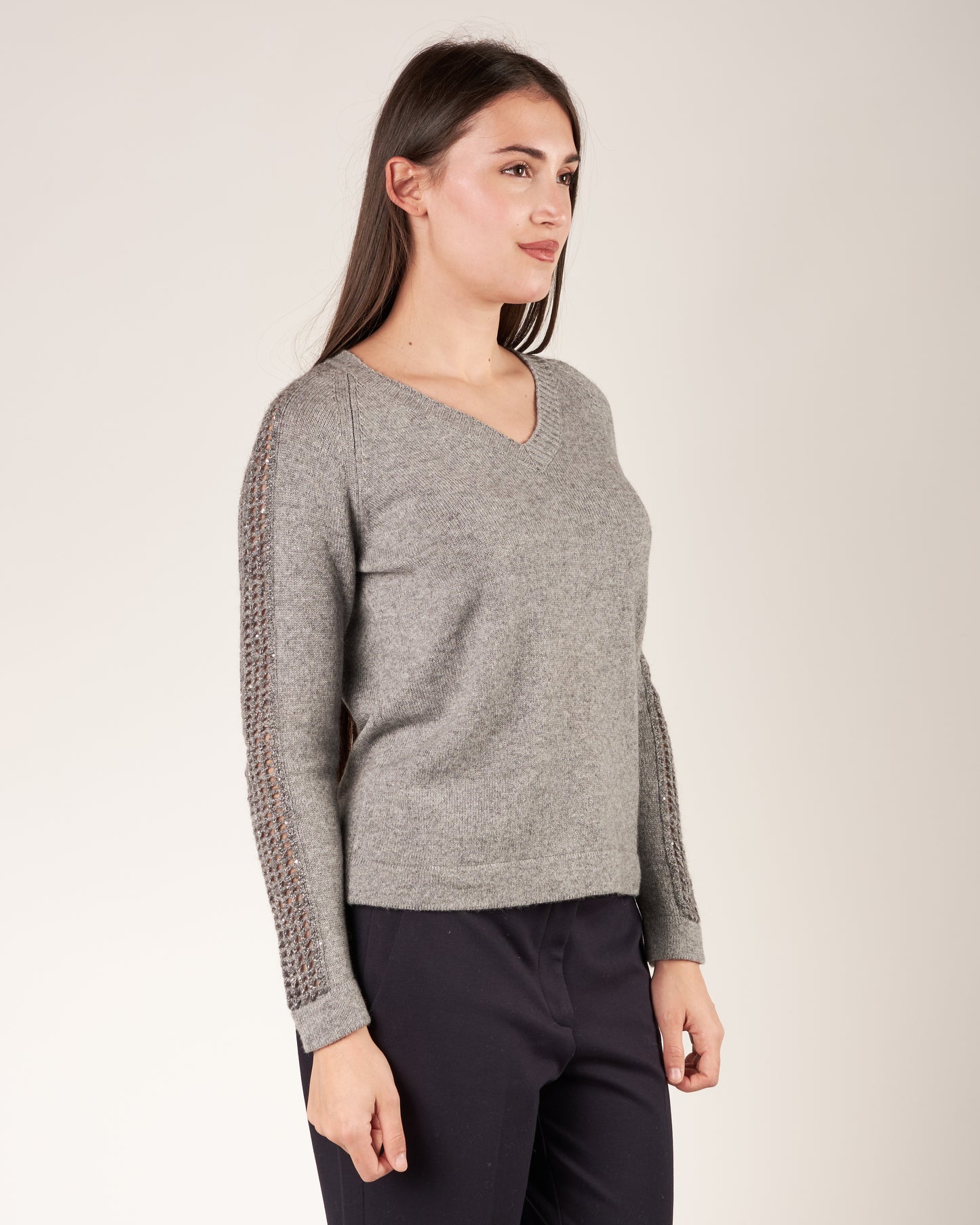 Pullover con maniche traforate