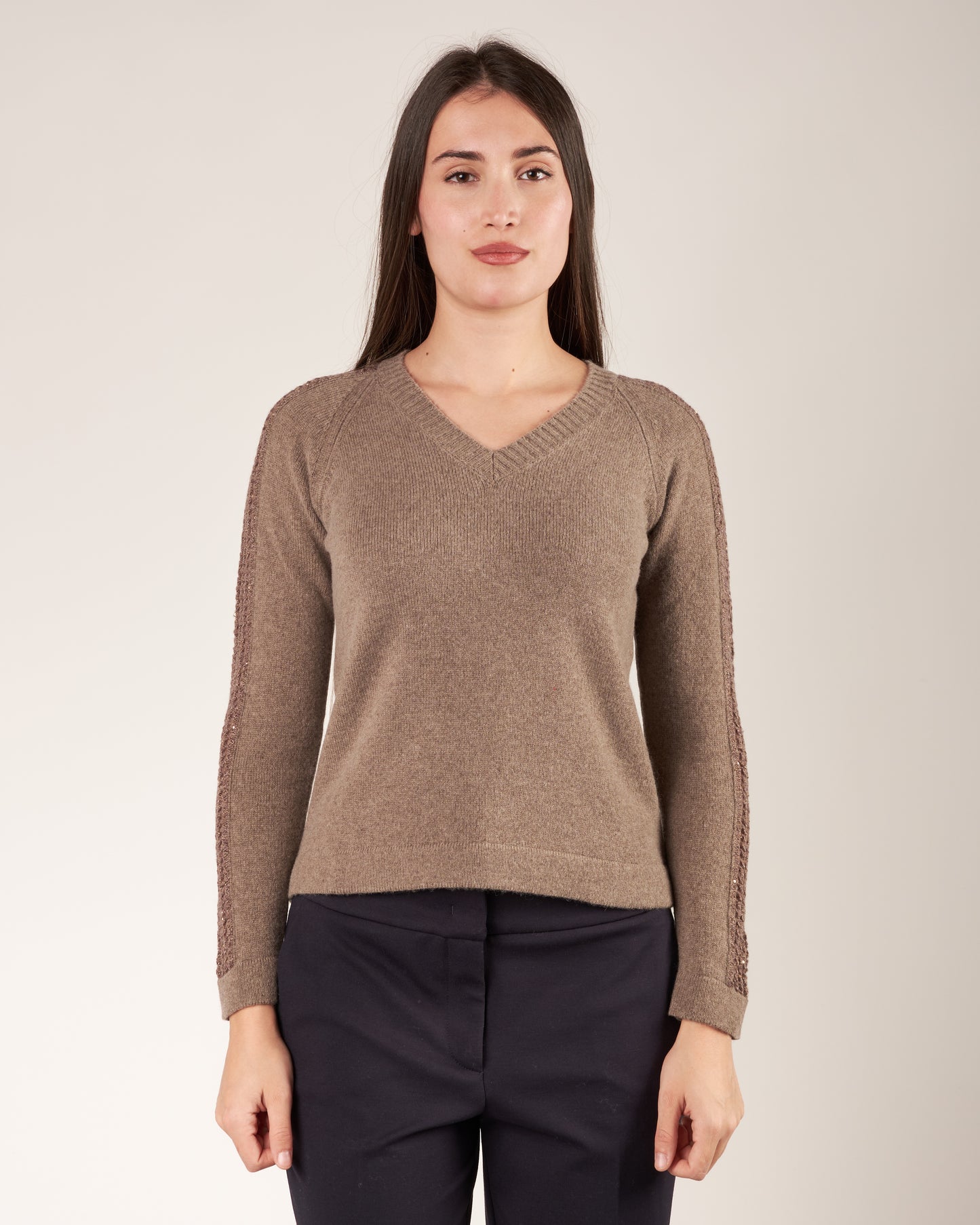 Pullover con maniche traforate