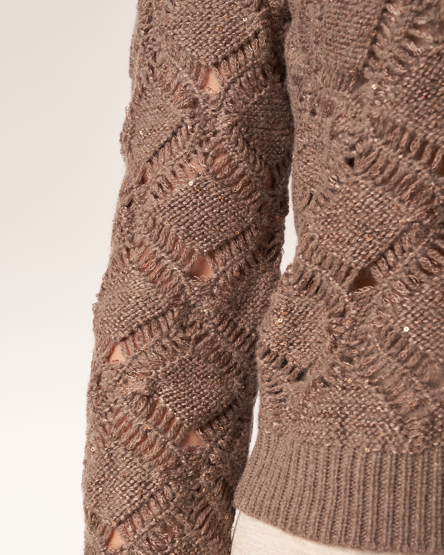 Pullover con scollo a V e paillettes