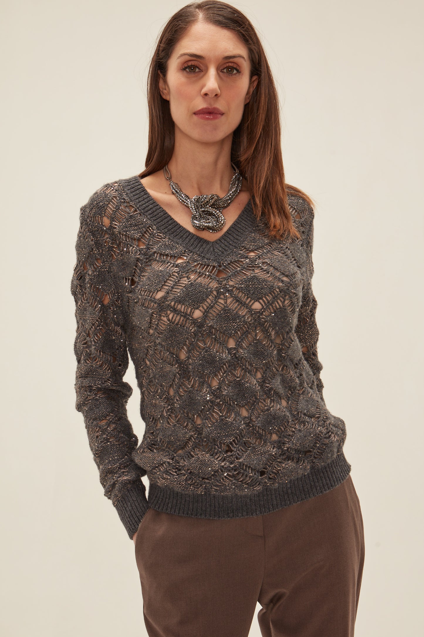 Pullover con scollo a V e paillettes
