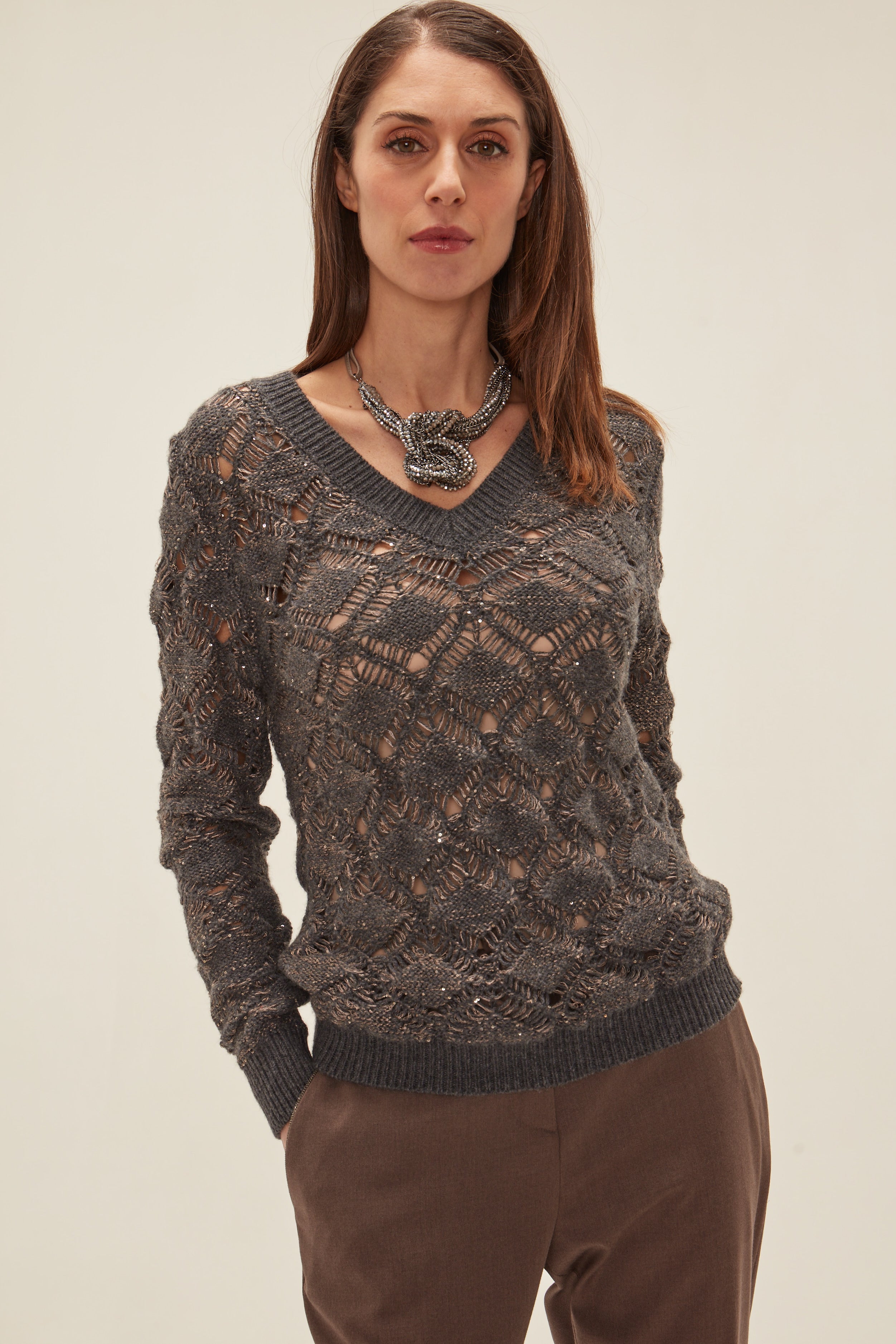 Pullover con scollo a V e paillettes