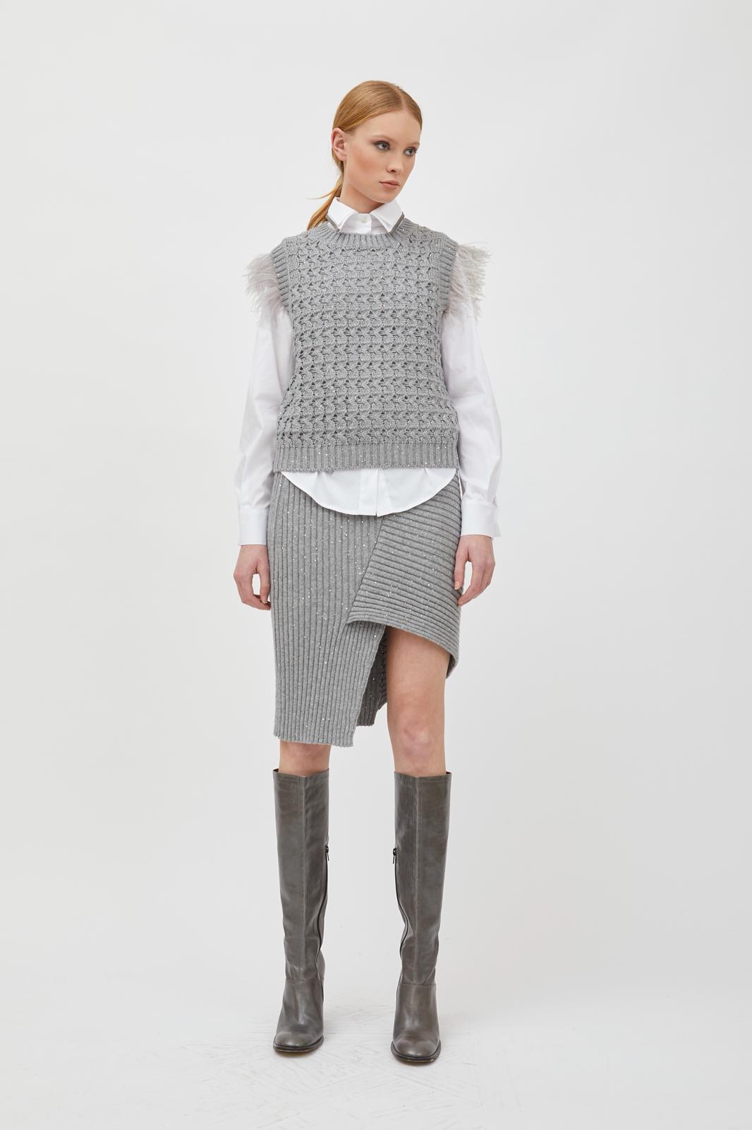 Gilet con piume