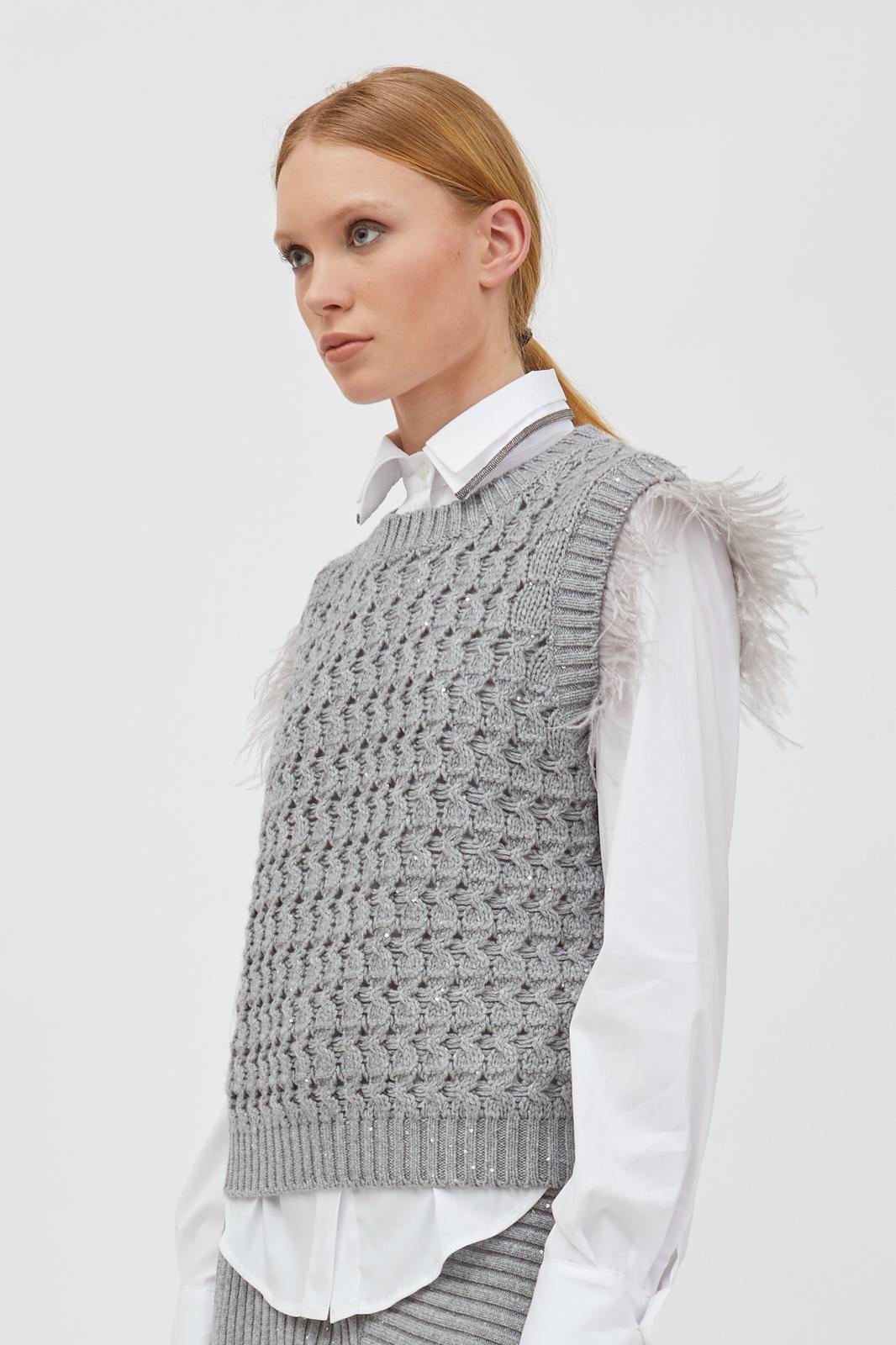 Gilet con piume